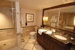 En suite bathrooms with separate jacuzzi tubs and steam showers